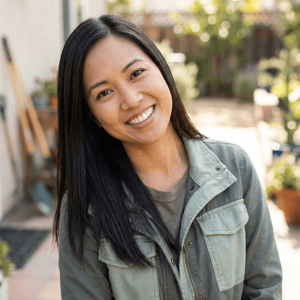 Melanie Chen, happy customer with a bright smile